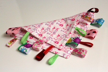 Baby Tag Blankets - back and front of one in pink