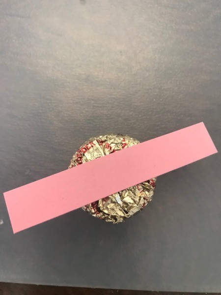 Candy Flower Bouquet - use a scrap of paper cut into a strip to hold candy in place