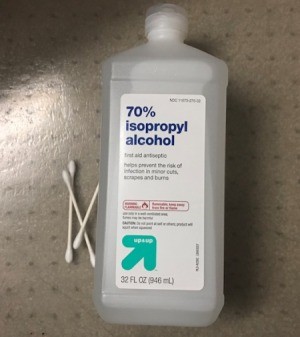 A bottle of 70% isopropyl alcohol and some Q-tips, for cleaning.