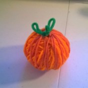 Crochet Yarn Pumpkins - stem glued to pumpkin