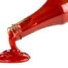 Ketchup Being Poured From Bottle