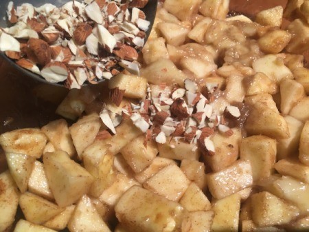 adding almonds to apples
