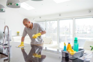 Man Cleaning a House