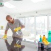 Man Cleaning a House