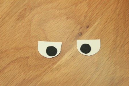 Halloween Frankenstein Soda Bottle Craft - glue pupils to eyes