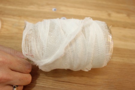 Halloween Mummy Jar Decoration - tie off the gauze