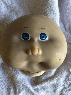 Cleaning a Cabbage Patch Kid's Head - discolored doll's head