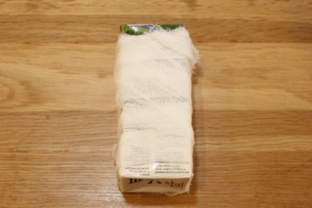 Halloween Mummy Juice Box - tie off extra gauze and tuck in ends