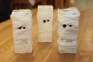 3 juice boxes wrapped to look like mummies.