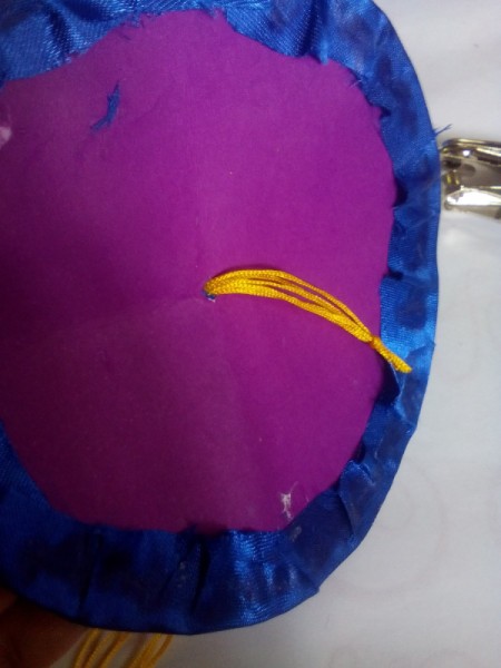 DIY Turkish Fez - insert strands for tassel and  tie at both ends