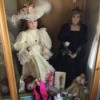 Value of Doll Collection - two dolls in a glass case
