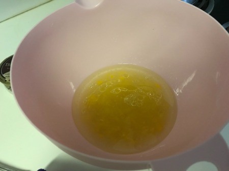 mixed egg and oil in bowl