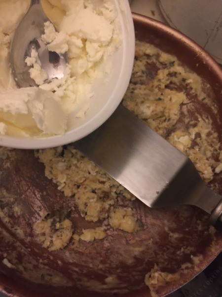 adding butter to Scrambled Eggs