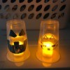 Pumpkin Decor - two finished cup pumpkins lit with LED candles