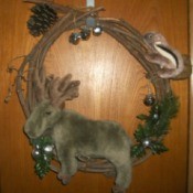 Moose Wreath - grapevine wreath with stuffed moose and chipmunk toys