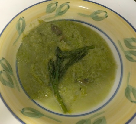 A bowl of pureed asparagus soup.