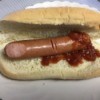 hotdog on bun with catsup