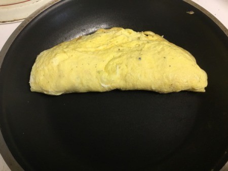 omelet cooking in pan