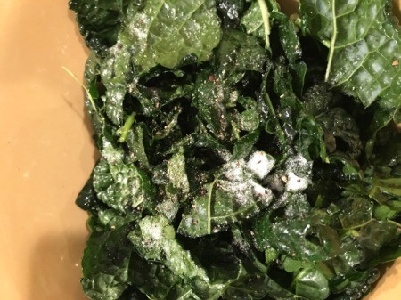 salt on oiled kale
