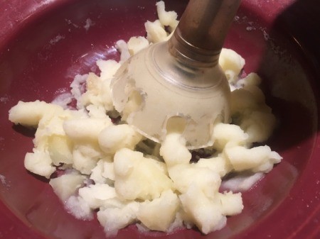 blending potatoes with immersion blender