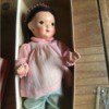 Identifying a Porcelain Doll - doll with painted face, in an old box