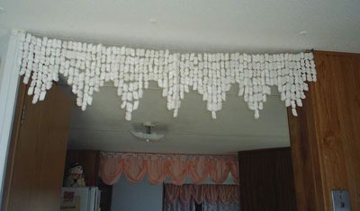 A Christmas decoration made from white packing peanuts.