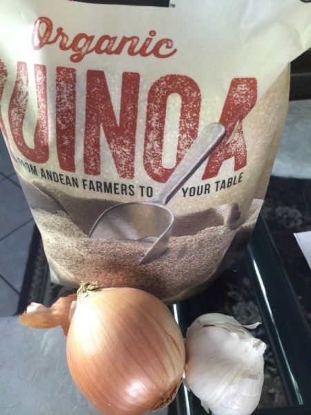 quinoa bag, onions and garlic