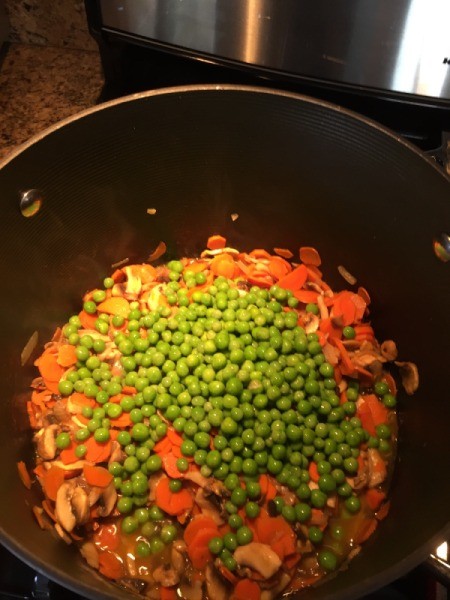 peas added to pan
