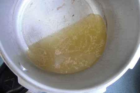 chicken broth in pan