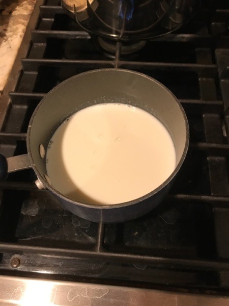 milk in sauce pan on stove
