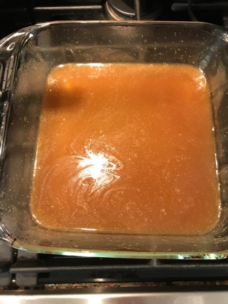 Pecan Sticky Bun glaze in baking pan bottom