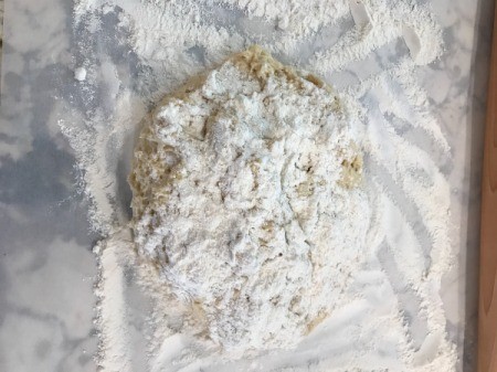 floured slab with dough