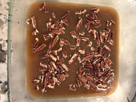 Pecans added to glaze