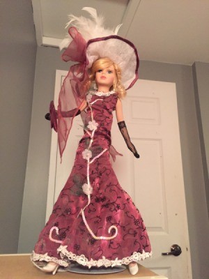 Identifying My Porcelain Dolls - doll with long dress and elaborate hat