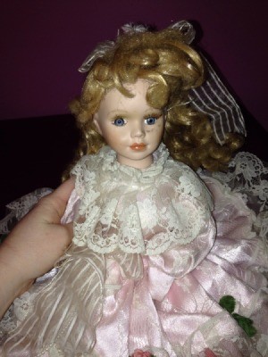 Identifying a Goldenvale Porcelain Doll - doll wearing a pink and white lace dress