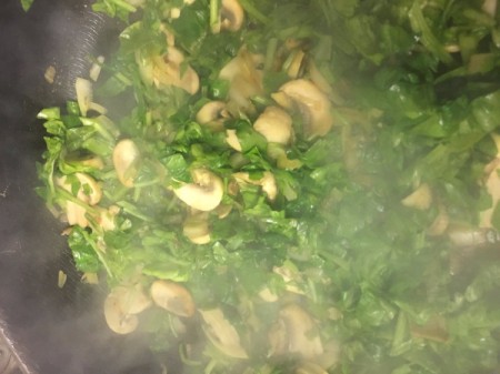 spinach added to pan