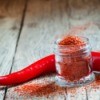 Whole Cayenne Pepper with Some Ground in Jar