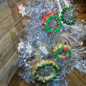 Miniature Wreaths - wreaths and silver snowflakes on silver tree