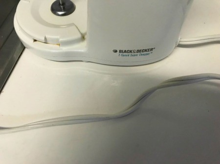 A clean appliance cord from a thrift store.