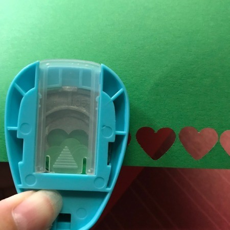 Christmas Tree Card - punch out hearts for the pop-up greeting inside the card