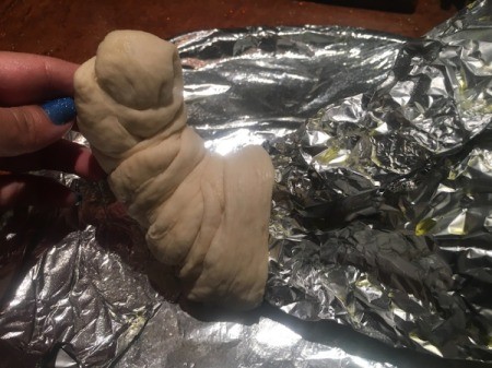 wrapping dough around form