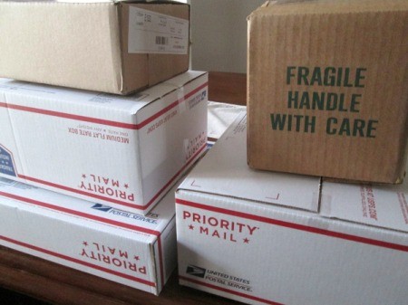 Recycled Boxes as Festive
Centerpieces - stacks of empty taped boxes