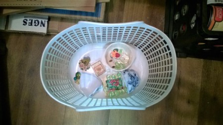 A basket full of broken items to be fixed or upcycled.