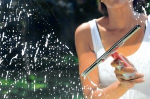 Woman Cleaning Window