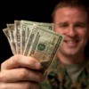 Military Serviceperson Holding Cash