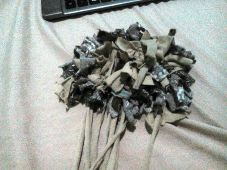 Handcrafted Rag Made From Old Shirts - continue tying until you reach the other end