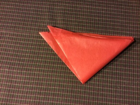 Thrifty Holiday Gift Wrapping - fold diagonally into a triangle and then again