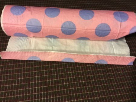 Thrifty Holiday Gift Wrapping - roll tube into the napkin and glue shut