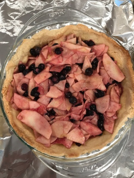 filling added to crust in pie pan