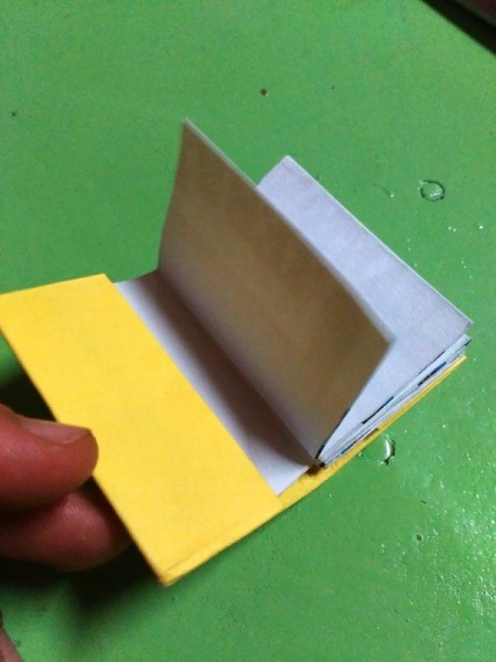 Cute Mini Notebooks - insert ends of folded pages into the cover and glue in place